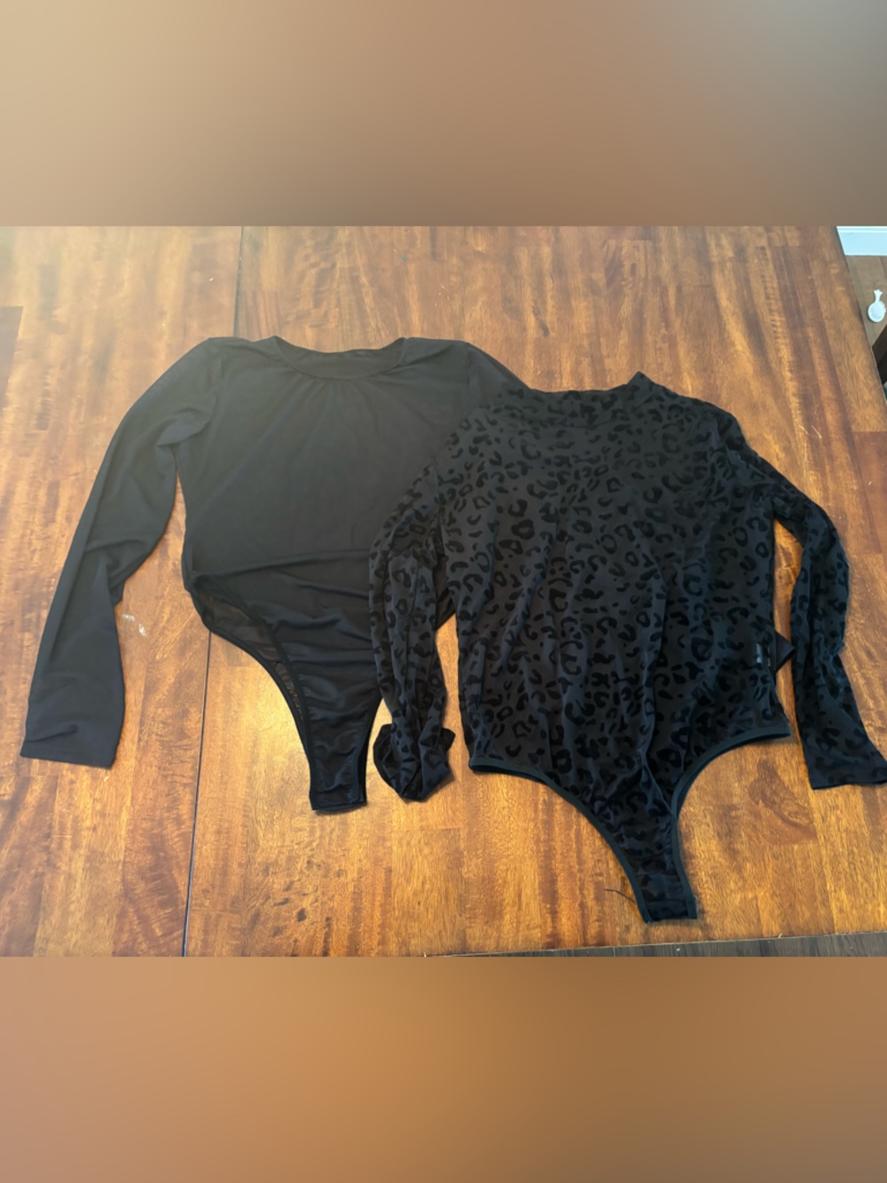 2 Black Long-Sleeve Bandeau Bodysuits